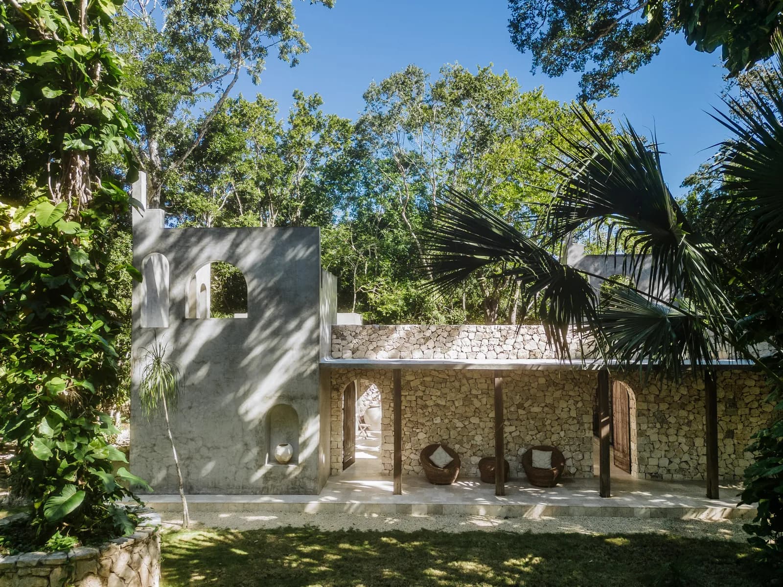 Onze Xpuha, stone chapel building set within the jungle